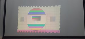 This projector has  a red gradient bottom