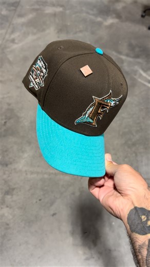 Capsule by Laced Up on Instagram: "Florida Marlins 10th Anniversary Metallic 10th Anniversary Walnut Brown/Teal (Grey Brim) 5pm ET Exclusively on Capsulehats.com 🔥‼️🚨"