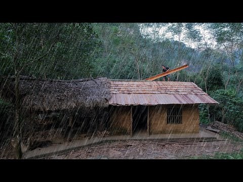 Complete cabin roof, planting bananas on a heavy rainy day. Primitive Skills (ep189)