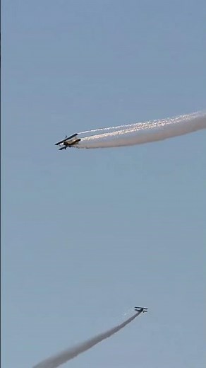 Biplane showing off for the crowd