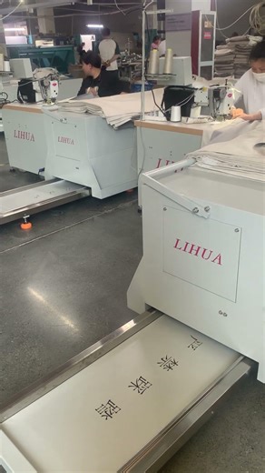 Automatic curtain hemming sewing machine with synchronized moving table for curtain factory