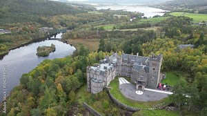 carbisdale castle set against backdrop river valley scotland's highlands castle's upward aerial drone forest kyle sutherland background scenic nature landscape exploration journey