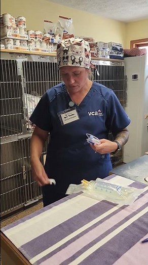 Setting up fluid bag for IV fluids