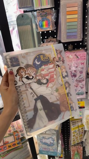 Exploring an anime-themed sticker notebook