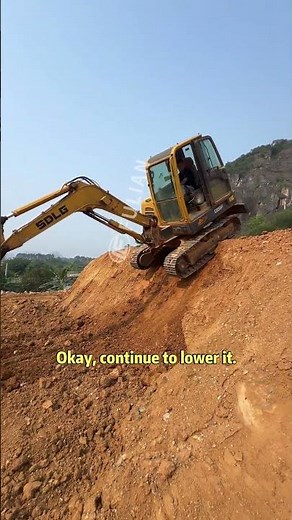How to Drive an Excavator Down a Steep Slope Safely