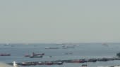 Beautiful wide timelapse, commercial container cargo ships and boats...