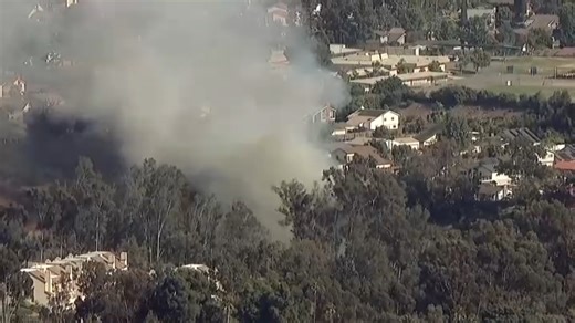 Crews stop progress of brush fire burning near homes in Tierrasanta