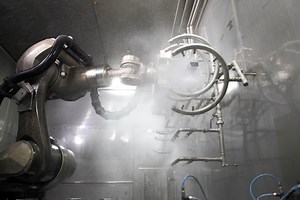 Robot in washing cell in the automotive industry | KUKA Global
