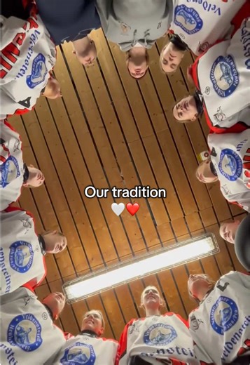 Celebrating Ice Dogs' Pre Game Tradition