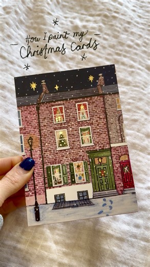Nushy | Fineliner & watercolour Illustrator on Instagram: "Despite only launching my cards last week, this Victorian house was actually the very first design I started working on for my Christmas cards! I painted it at the start of September after a walk around the beautiful streets near my favourite gallery in Spitalfields. These houses always make me imagine what Christmas must have looked like there in Victorian England 🎄 To make my cards I start by painting each one by hand using a mixture 