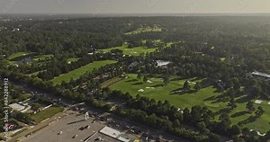 Augusta Georgia Aerial v52 birds eye view tracking along Washington Road, the border of National Golf Course, showcasing lush fairways and intricate layouts - Shot with Mavic 3 Pro Cine - October 2023