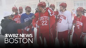 Boston University hockey players walk to practice during blizzard