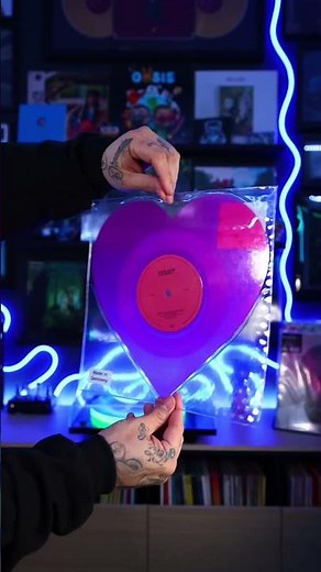 Olivia Dean’s heart-shaped vinyl run is such a beautiful collector moment, with “So Easy (To Fall In