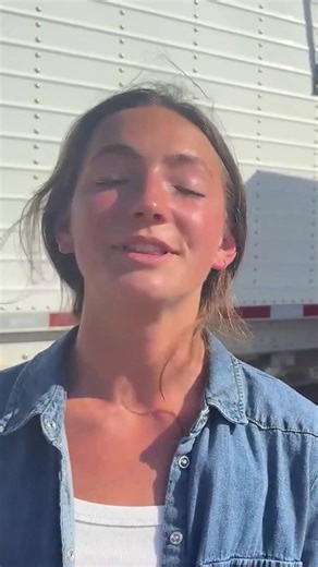 Teaching him how to run a combine