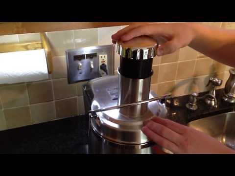 Making orange juice with the power juicer pro. By How-to Bob