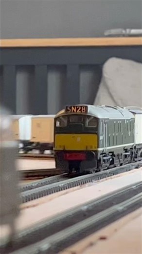 Class 24 powers through Benchester station while class 43 blasts past