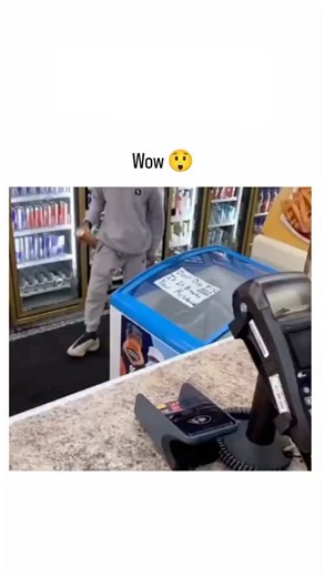 MeMo on Instagram: "The post shares a 73-second viral video depicting a convenience store clerk kindly preparing a snack for a young boy, including pouring orange soda into a paper bag as an improvised cup, serving chips with tongs, and mixing Nesquik chocolate milk, which has amassed over 4.6 million views in two days. Reactions are polarised: many praise the wholesome act of compassion, but sarcastic replies mock it as preferential treatment for "low-class workers," prompting the poster to que
