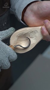 Spoon carving is a traditional woodworking craft. The number one tool you will need to carve a wooden spoon is a spoon carving knife, also known as a hook knife. It is clear from the name that it's used for carving spoons: hollowing out the bowl to make the needed depth and shape. To make a wooden spoon with a spoon carving knife, tilt the blade slightly until it begins to "shave" and remove some thin layers of wood. But remember, you don't dig in too deep not to weaken the entire carving. The m