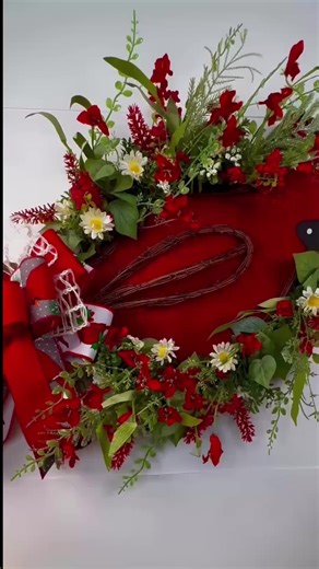 Welcome the beauty of nature into your home with this exquisite handcrafted Cardinal Twig Wreath. This unique piece is a perfect blend of rustic charm and elegant floral arrangements, making it an ideal addition to your seasonal or everyday decor. The centerpiece of this wreath is a beautifully crafted cardinal, symbolizing love and warmth. The bird is adorned with intricate detailing and lifelike colors, made from durable burlap material. The wreath is constructed on a sturdy twig base, providi