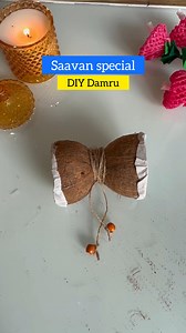 DIY Damru - Shiva’s Drum Made this earthy DIY Damru with coconut shells, butter paper, jute rope, wooden beads and a whole lot of rhythm. Who knew two coconuts could sound this cool? 🥁 Facts about Damru : The damaru is a small hourglass-shaped drum held by Lord Shiva. According to Hindu mythology, Shiva played the damaru during his Tandava dance, the cosmic dance of creation and destruction. It is believed that the Sanskrit language originated from the sounds of Shiva’s damaru—14 basic sound pa
