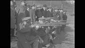 MS John C. Garand, inventor of the Garand rifle, explaining rifle to...