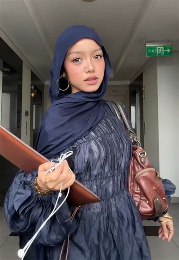 Stylish Accessories: Matching Hijab, Heels, and Laptop Sleeve