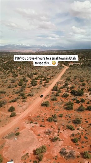 High on the Utah plateau, where desert winds sculpt stone and storms sweep across an endless horizon, Factory Butte rises like a monument to deep time — a towering badland crown carved from shale, clay, and ancient sediment. Its fluted ridges glow steel-blue at dawn, catching the first light as it spills across the Caineville Desert. At sunset, the butte turns ember-red, a cathedral of color in a landscape stripped to its elemental bones. There are no forests here, no rivers, no soft edges — jus
