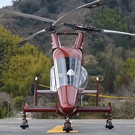 According to Kaman Aerospace, the creator of the K-Max seen here, the intermeshing rotor system has a larger disc area; so it has greater lift capabilities. As such, the K-Max can lift its own weight (6,000 lbs)