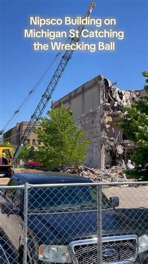 The wrecking ball is giving everything it’s got to the old NIPSCO building on Michigan St… and that beast is taking those blows! Built in a different era. Built to last.