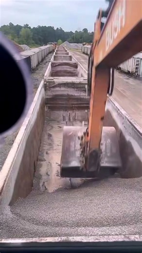 Excavator Unloading Train