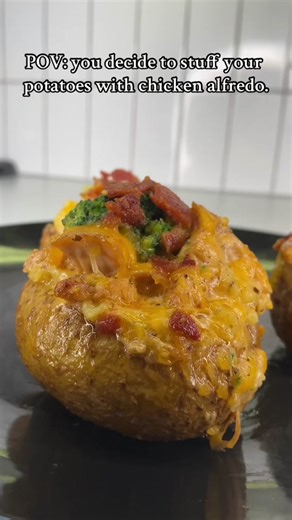 Bake 4 large potatoes at 375f for 45 minutes to an hour. Slice potatoes lengthwise and scoop out the potato flesh, leaving a thin rim of potato (about ¼ inch rim) around the edges to help the skin hold its shape. Add potato flesh to a bowl and add butter, heavy cream, bacon, and seasonings. Mash potatoes until light and fluffy. Add shredded cheddar cheese to the bottom of potato skins then stuff with potato mixture. Add alfredo sauce, chicken and broccoli on top of potatoes. Then sprinkle chedda