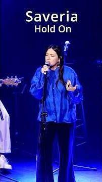 Saveria performs her song "Hold On"