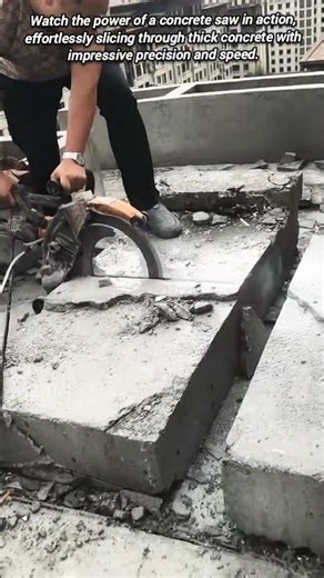 Powerful Concrete Saw Slicing Through a Slab.