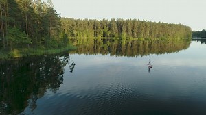 Woman wandering in nature on a paddleboard - Free Stock Video