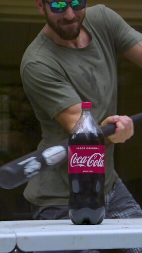 Baseball Bat vs. Coca Cola | Slow Motion Impact Test