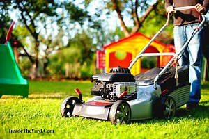 5 Reasons For Why Is My Lawn Mower Spitting Out Grass? - Inside The Yard