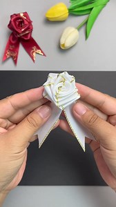 Title: How to Make a Beautiful Ribbon Rose: A Folding Technique Hashtags: #RibbonRose #DIYCrafts #HandmadeFlowers #CraftTutorial #NoGlueNoCut #FoldingTechnique #HandmadeRoses #DIYDecor #CraftingIdeas #CreativeCrafts | paper craft ideas