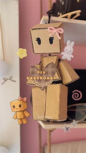 PINK SWAN on Instagram: "📌This is a trial reel!! If it reached you and you’re into crafting, stick around and follow for more creativity. Made this little cutie robot-chan from cardboard ♡ Full DIY tutorial’s up, go make your own tiny buddy!! And Any cute nickname ideas for her? (DIY CARDBOARD RAGDOLL) Inspo from: @wajeehuhh._ #diy #craft #pinterest #instagood #cute #reels #tutorial #cardboard #robot #ragdoll"