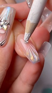 Cat Eye Shell Glitter Nail Design ✨💅🏼 #seashells #cateyenails #glow #naildesign #prettynails #nailinspo #ctto @prism.nail | Iches ArteNails Supplies