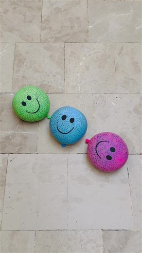Relaxing Sounds of Green, Blue, and Pink Smiley Balloons