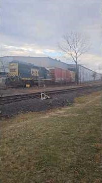 CSX 6160 Pushing Boxcars into Pioneer Commodities