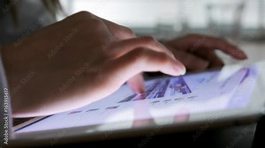 Woman finger touching on digital computer at home office