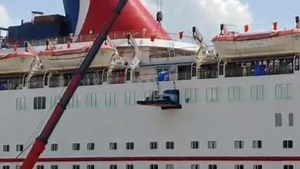 The moment when the Rolls Royce was being removed from the Carnival Ecstasy. Cruising With Carnival | Carnival Cruise Line Miami Blog