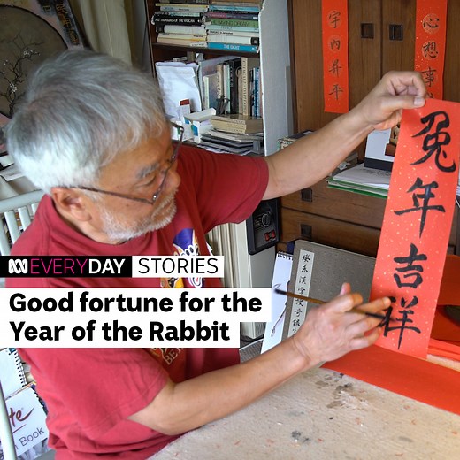 Calligrapher and artist Franz Cheung says Chinese art "is about achieving perfect unity between human and nature", but during Chinese Lunar New Year, traditional calligraphy takes focus. This traditional practice involves using brushes to write lucky wishes on red paper, with finished decorations hung around households for a year of good luck. "It's a very happy moment for me, to share my culture in this way." | ABC Australia