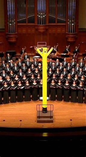Choir Responds To Inflatable Man's Dramatic Direction #choirs #concert #performance