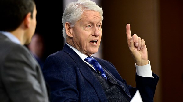 Bill Clinton pictured with Jeffrey Epstein in never before seen photos released by DOJ