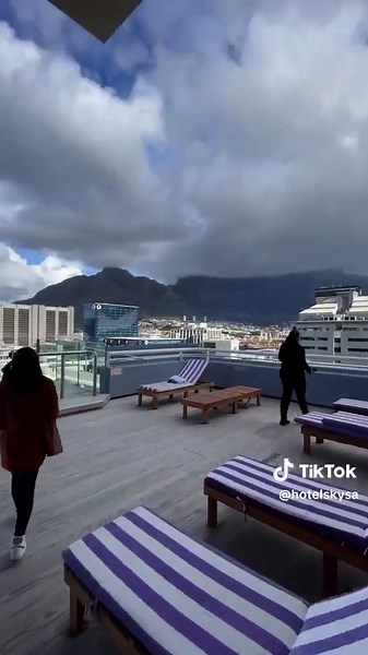 Enjoy breathtaking views at Hotel Sky Cape Town, dine at Infinity Restaurant on the 26th floor, meet AI companions, and try our 30m rooftop Sky-Hi ride. Experience our warm hospitality - book now at reservations.capetown@hotelsky.co.za or call 021 879 5040. 📸: @nastalgic__ #HotelSky #CapeTown #Hospitality #Travel #VacationMode #StaycationGoals #CapeTownHotels #SkyHiRide