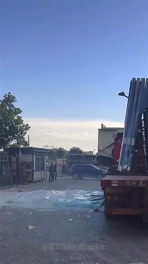 Glass Sheets Fall From Flatbed Truck