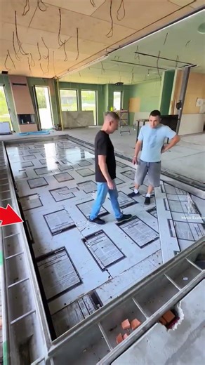 The boy built a swimming pool on the floor of the house