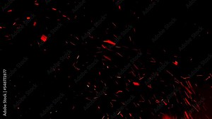 A burning firestorm inferno with hot ember ash flying into the black night sky. Real footage great to use as an overlay texture